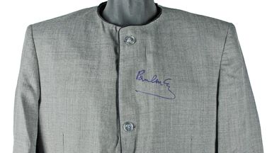 A jacket signed by Paul McCarthy is also listed as one of the items available. Pic Iconic Auctions